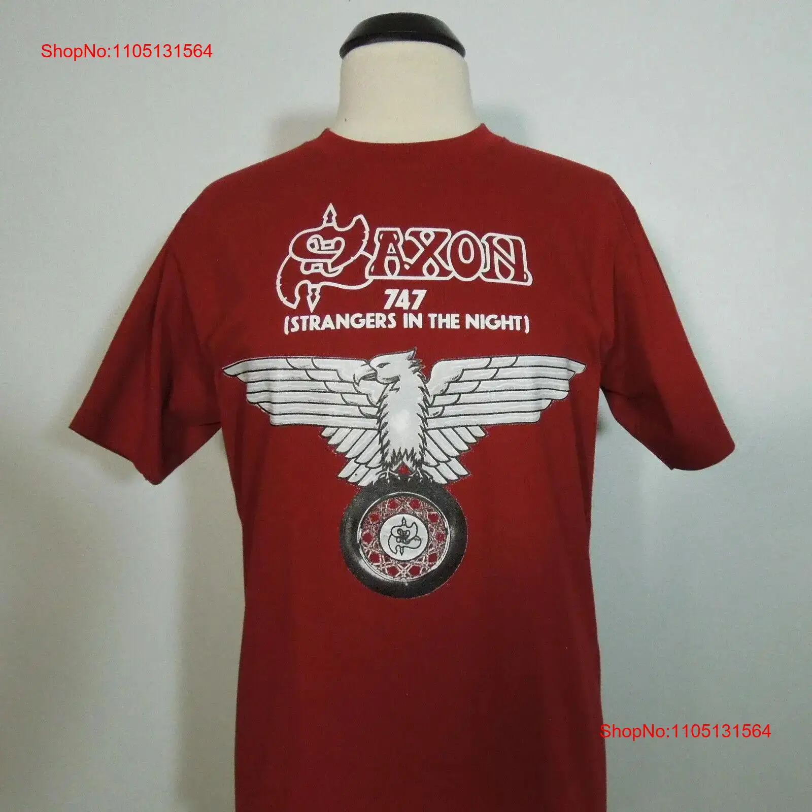 SAXON 747 Strangers In The Nig - огляд і ціна Vintage Fashion Logo